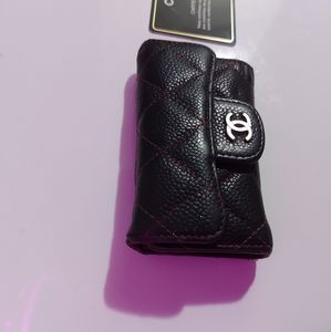 Auth Chanel key wallet, used with care.